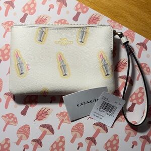 Coach Cream Wristlet with Lipstick Design